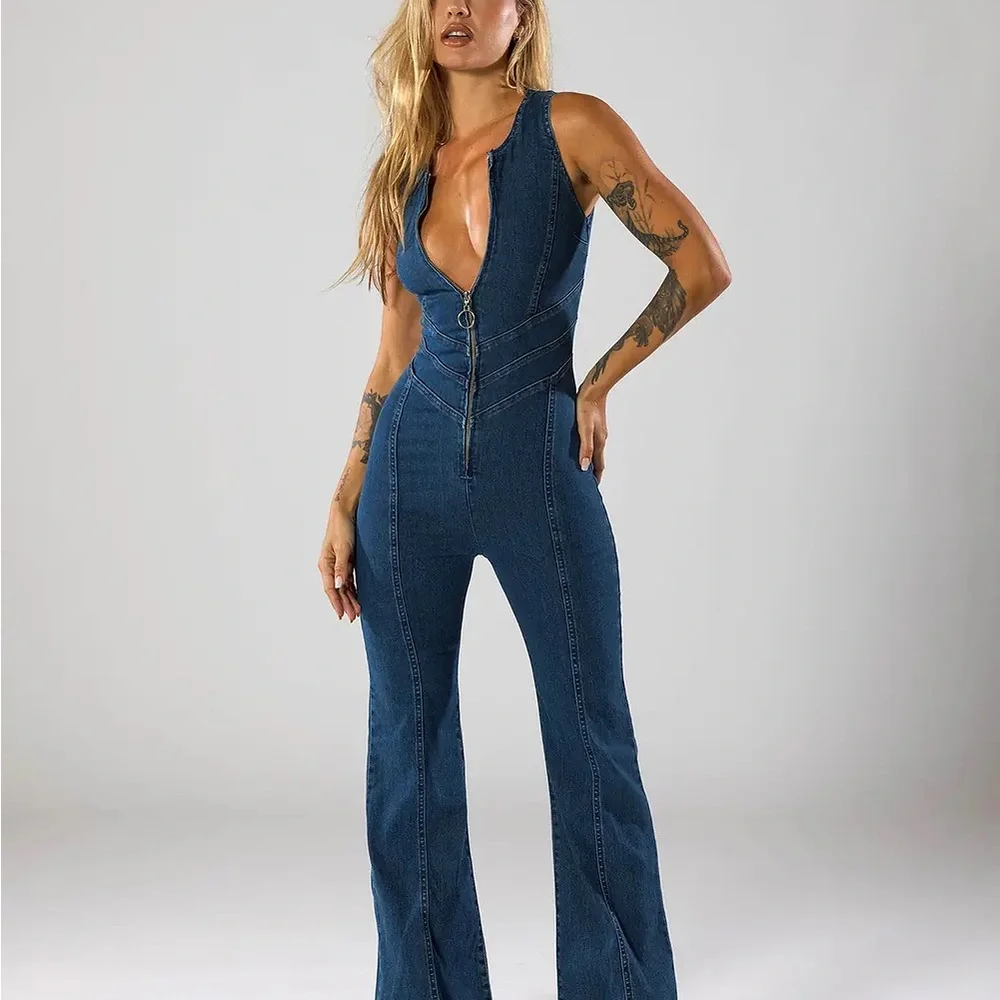 REVICE Hollywood Heartthrob Denim Jumpsuit with Flared Legs and Heart Cutout - Picture 2 of 3